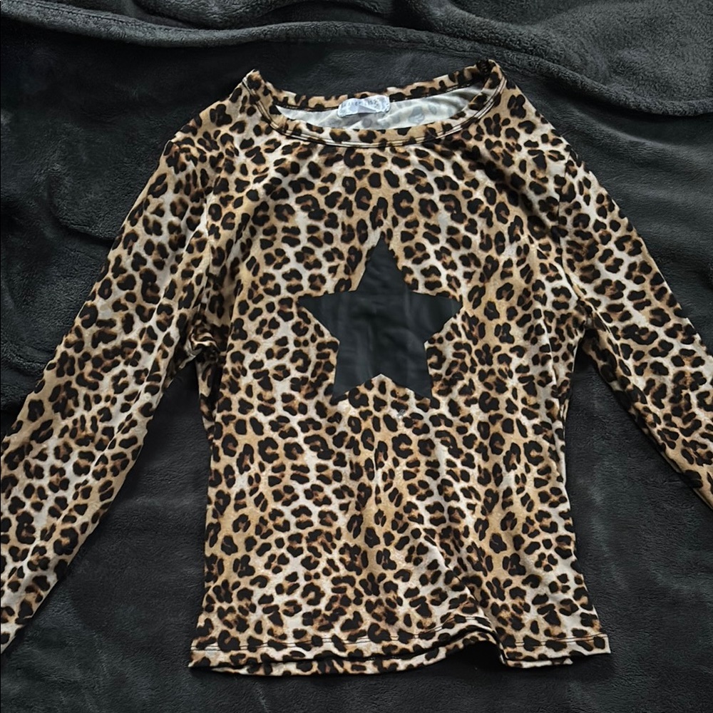 Leopard Print Woman Top with Black Star Worn Once.